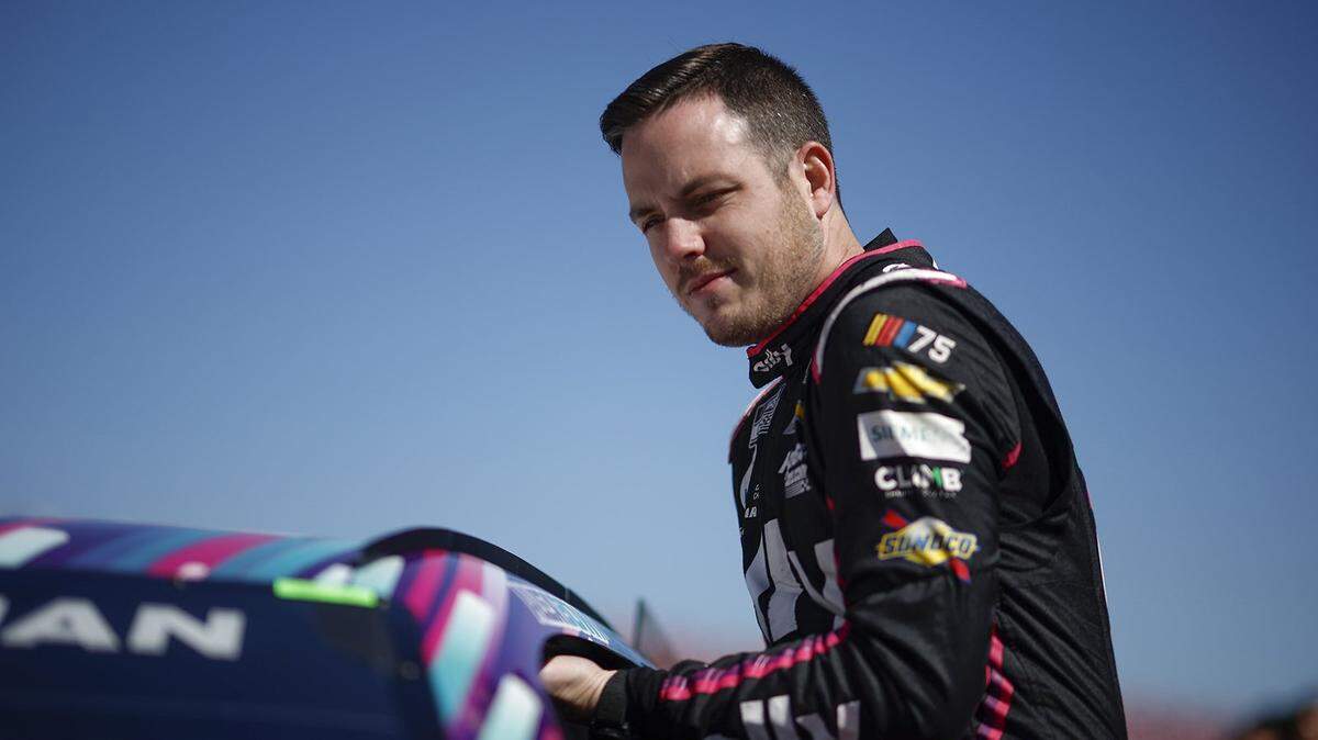 Alex Bowman, driver of the #48 Ally Chevrolet, enters his car during qualifying for the NASCAR Cup Series GEICO 500 at Talladega Superspeedway on April 22, 2023, in Talladega, Alabama. (Sean Gardner/Getty Images/TNS)