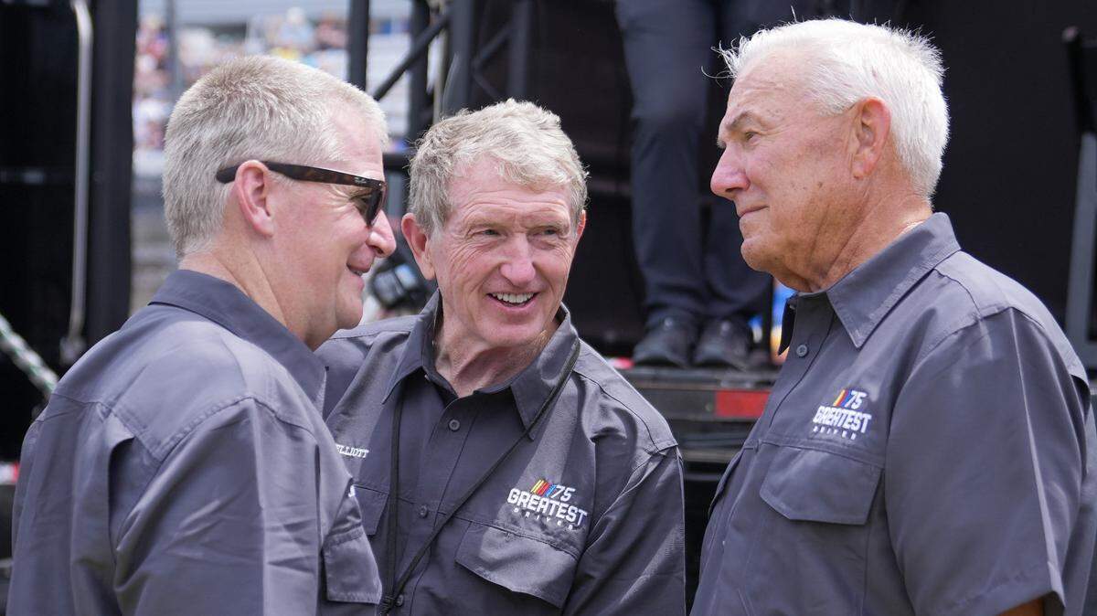 Bill Elliott (center) talks with Jeff Burton (left) and Dale Jarrett pre-race at Darlington Raceway. All three competed in the Cup race at North Wilkesboro Speedway in September 1996.