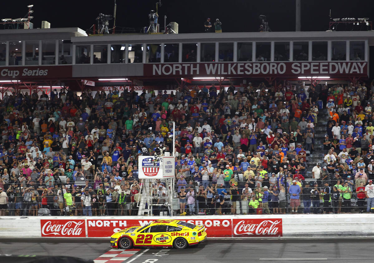 NASCAR Cup Series driver Joey Logano crosses the finish line to win the NASCAR All-Star race at North Wilkesboro Speedway in North Wilkesboro, North Carolina, on Sunday, May 19, 2024.