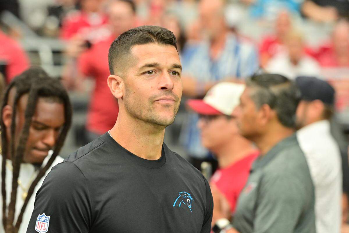 Carolina Panthers head coach Dave Canales enters the field prior to Sunday’s first half against the Arizona Cardinals at State Farm Stadium.