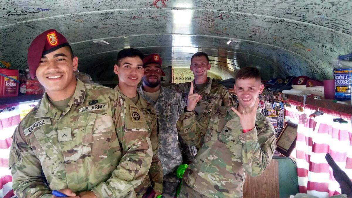 Troops visit the red, white and blue bus in the Charlotte Motor Speedway infield every Coca-Cola 600. They don’t leave before signing their name on the bus’s interior.