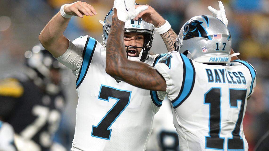 Carolina Panthers quarterback Will Grier, left and wide receiver Omar Bayless, right, celebrate Grier’s touchdown run against the Pittsburgh Steelers during fourth quarter action at Bank of America Stadium in Charlotte, N.C., on Friday, August 27, 2021.