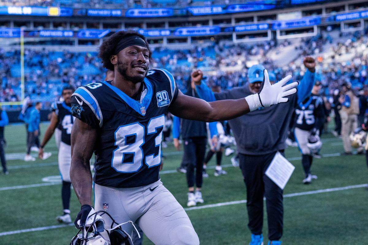 Nov 3, 2024; Charlotte, North Carolina, USA; Carolina Panthers wide receiver David Moore (83) dances after defeating the New Orleans Saints at Bank of America Stadium. Mandatory Credit: Scott Kinser-Imagn Images