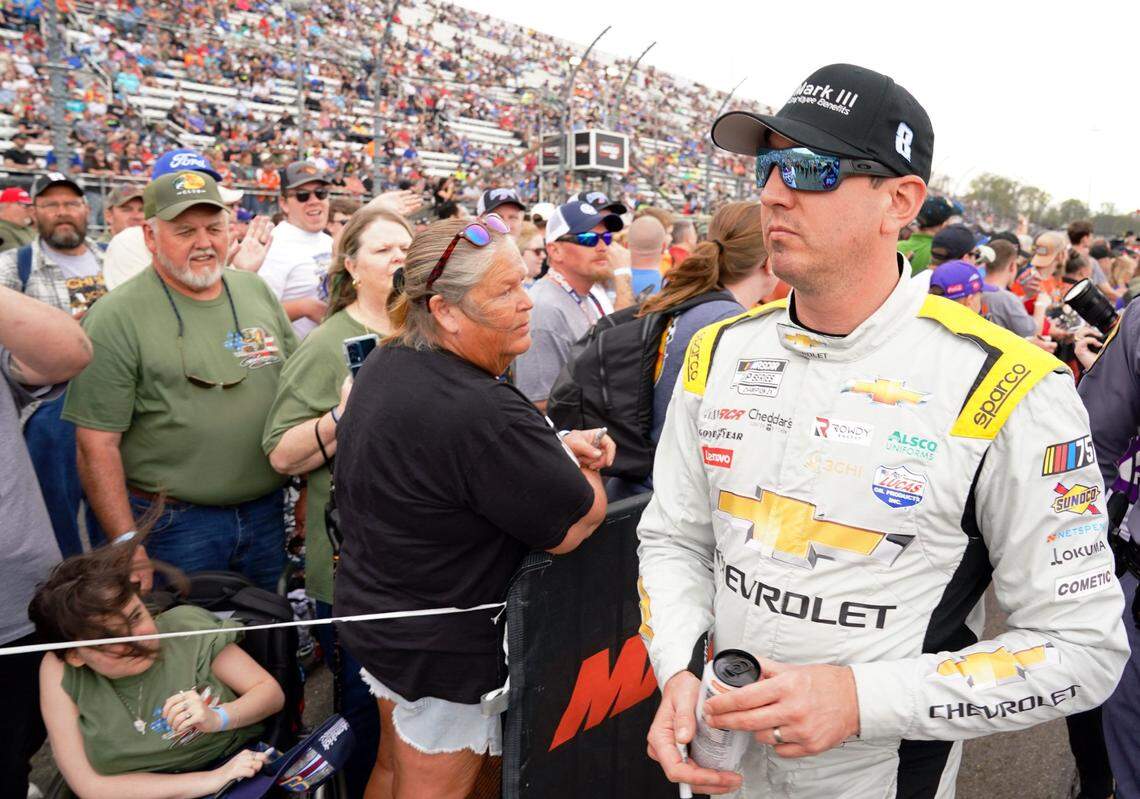 NASCAR Cup Series driver Kyle Busch (8) walks along fans during prerace festivities earlier this season before NOCO 400 at Martinsville Speedway.