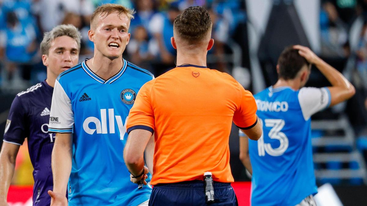 Charlotte FC forward Karol Swiderski argues with official Lukasz Szpala during the first half against Orlando City in Charlotte, N.C., Sunday, Aug. 21, 2022. The forward disagreed with a Major League Soccer rule that impacted Charlotte FC’s draw with Columbus on Wednesday, Oct. 5, 2022.