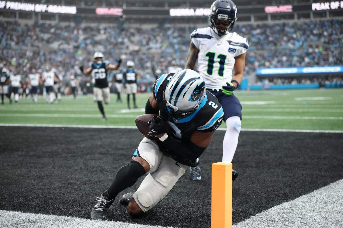 Carolina Panthers cornerback Mike Jackson intercepts a pass during the third quarter of Sunday’s game against the Seattle Seahawks at Bank of America Stadium.