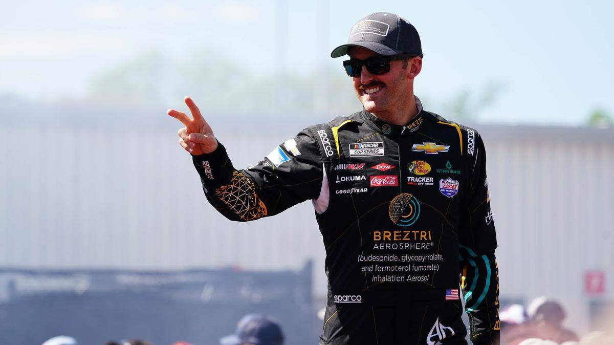 Apr 2, 2023; Richmond, Virginia, USA; Austin Dillon waves to fans before the race during the Toyota Owners 400 at Richmond Raceway. Mandatory Credit: John David Mercer-USA TODAY Sports