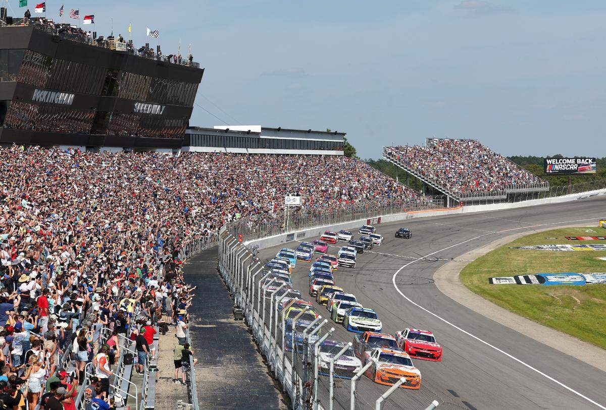 The field in the North Carolina Education Lottery 250 passes the front stretch to start the race at Rockingham Speedway on Saturday, April 19, 2025.