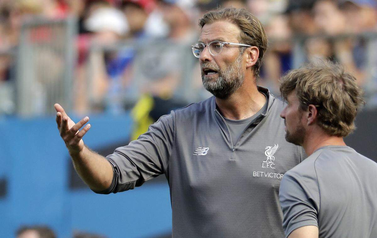 Liverpool manager Jurgen Klopp directs his team against Borussia Dortmund during the second half of an International Champions Cup tournament soccer match in Charlotte, N.C., Sunday, July 22, 2018. (AP Photo/Chuck Burton)