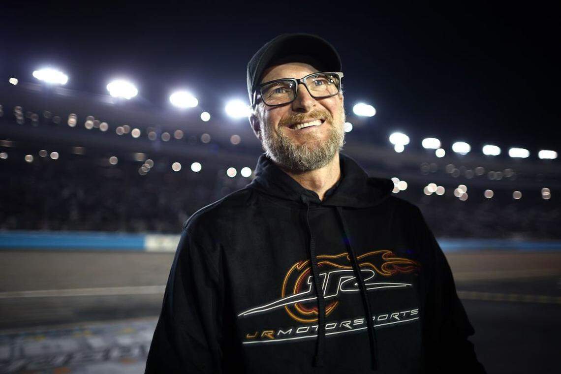 AVONDALE, ARIZONA - NOVEMBER 09: NASCAR Hall of Famer and JR Motorsports owner, Dale Earnhardt Jr. reacts to Justin Allgaier, driver of the #7 BRANDT Chevrolet, winning the 2024 NASCAR Xfinity Series Championship in the NASCAR Xfinity Series Championship Race at Phoenix Raceway on November 09, 2024 in Avondale, Arizona. (Photo by Jared C. Tilton/Getty Images)
