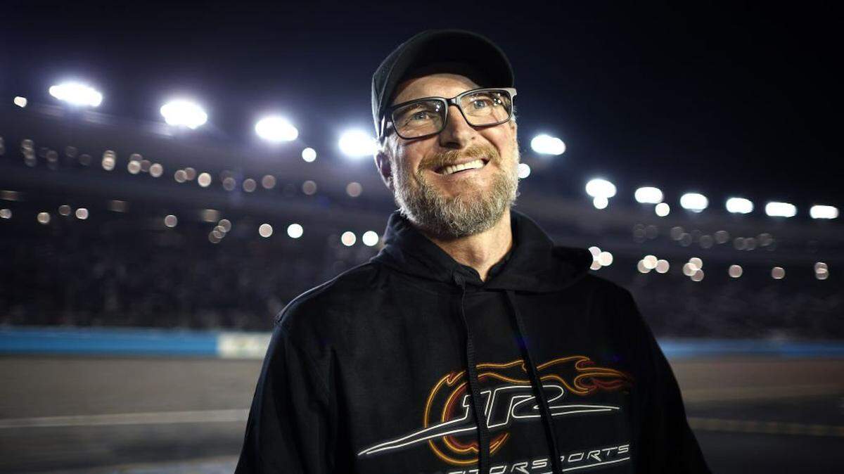 AVONDALE, ARIZONA - NOVEMBER 09: NASCAR Hall of Famer and JR Motorsports owner, Dale Earnhardt Jr. reacts to Justin Allgaier, driver of the #7 BRANDT Chevrolet, winning the 2024 NASCAR Xfinity Series Championship in the NASCAR Xfinity Series Championship Race at Phoenix Raceway on November 09, 2024 in Avondale, Arizona. (Photo by Jared C. Tilton/Getty Images)
