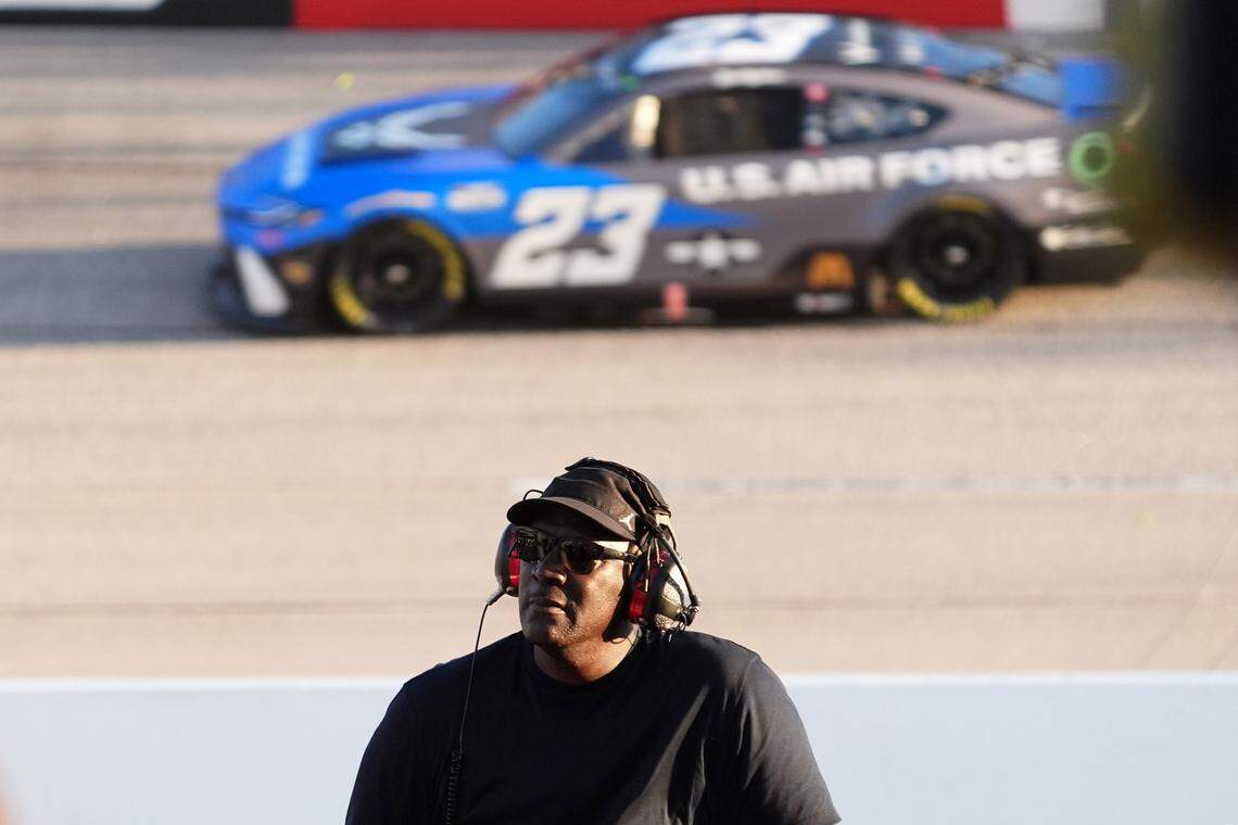 Sep 1, 2024; Darlington, South Carolina, USA; NASCAR Cup Series Team 23XI owner Michael Jordan watches a video board as NASCAR Cup Series driver Bubba Wallace (23) races during the Cook Out Southern 500 at Darlington Raceway.