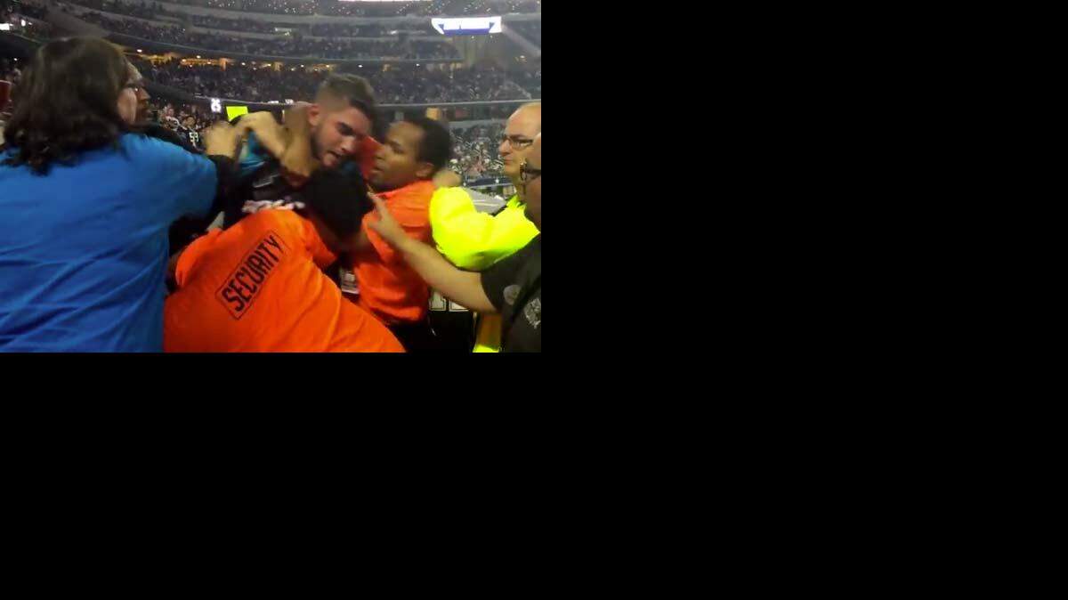 Police are investigating an assault complaint against an AT&T Stadium security guard over an incident during the Thanksgiving Day game between the Cowboys and Carolina Panthers.