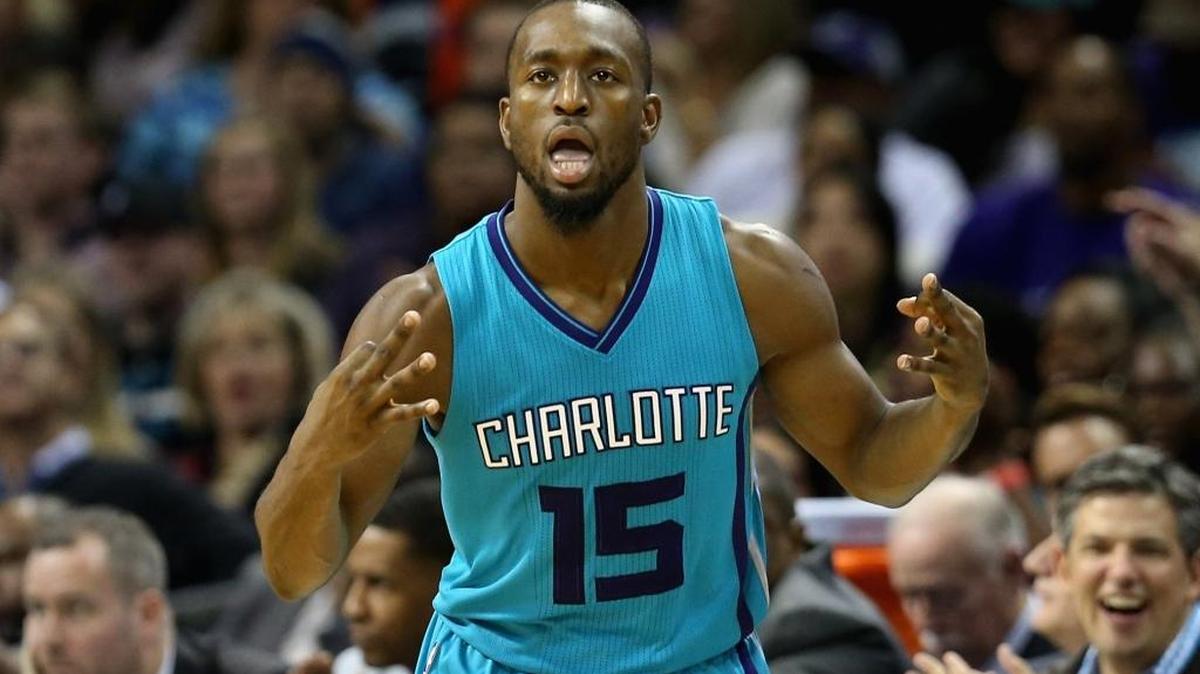 Kemba Walker of the Charlotte Hornets reacts after making a 3-point shot during their game against the Cleveland Cavaliers at Time Warner Cable Arena on November 27, 2015.