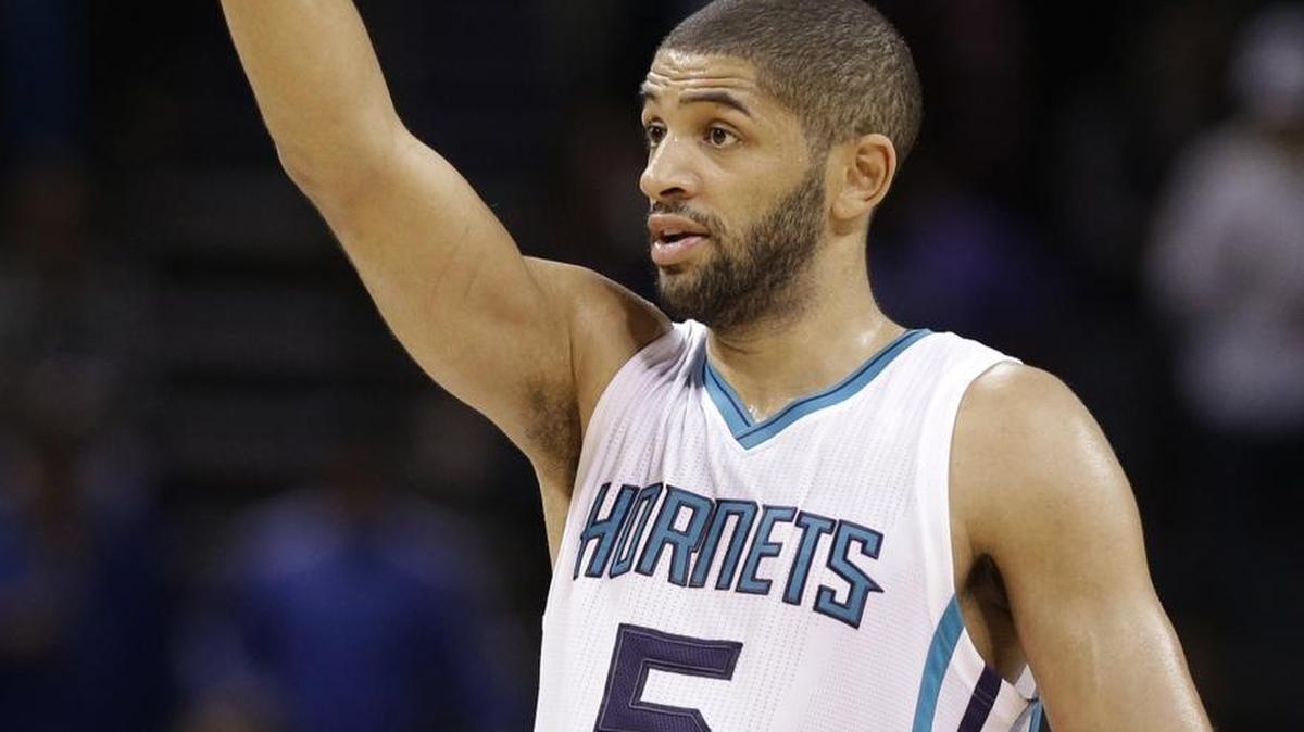 Charlotte Hornets' Nicolas Batum (5) reacts in the second half of an NBA basketball game against the Brooklyn Nets in Charlotte, N.C., Wednesday, Nov. 18, 2015. The Hornets won 116-111. (AP Photo/Chuck Burton)