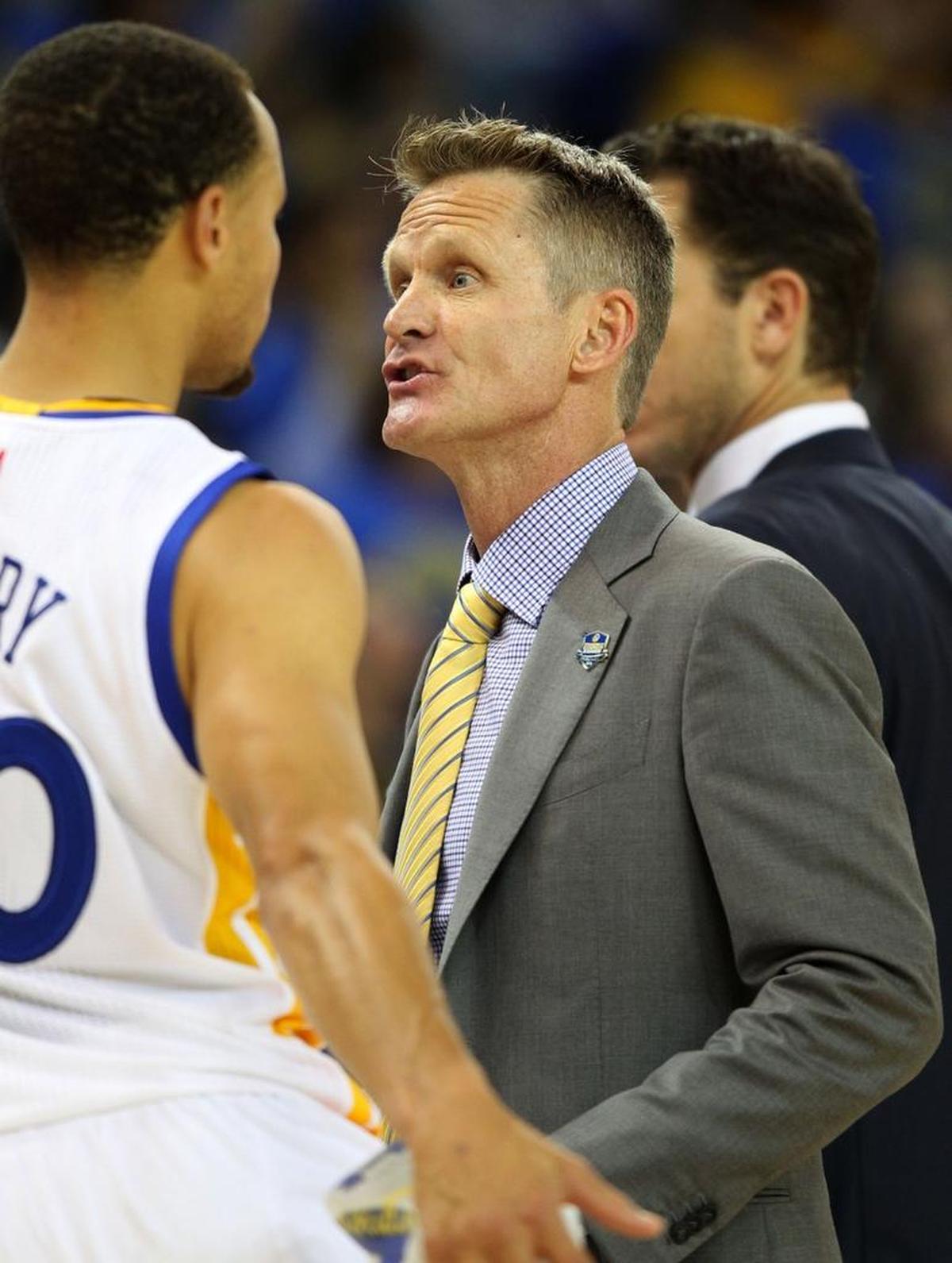 When Steve Kerr (right) was general manager of the Phoenix Suns, he was close to a trade to acquire the draft rights to Stephen Curry (left). Now Kerr coaches Curry at Golden State.