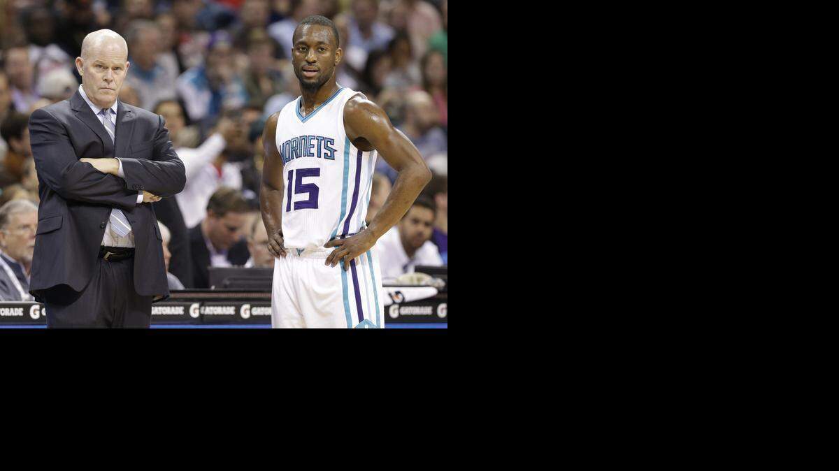 
Charlotte Hornets head coach Steve Clifford, left, says he plans to pair point guard Kemba Walker, right, with recently acquired guard Mo Williams once Walker returns from a knee injury. 
