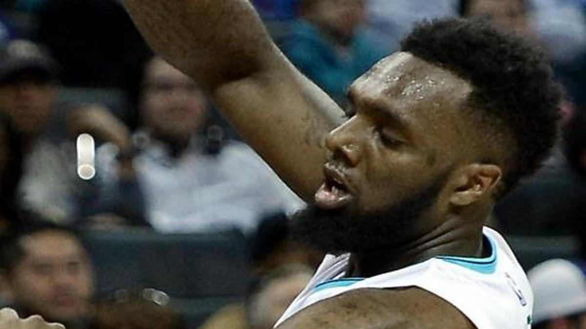 Charlotte Hornets coach Steve Clifford hopes for P.J. Hairston (right) to develop into a defensive stopper this season.