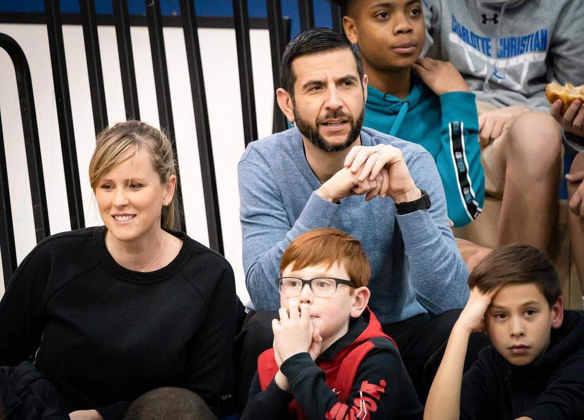 Says James Borrego, photographed earlier this month at Charlotte Christian School with wife Megan, left, and sons Nick and Zac, in front of him: “When I am home, I want to be home. And when I’m in town, I try to make every event possible, every game possible, (to be) there for them. So they know when I’m in town, I’m doing everything I can to be around them and rooting them on.”