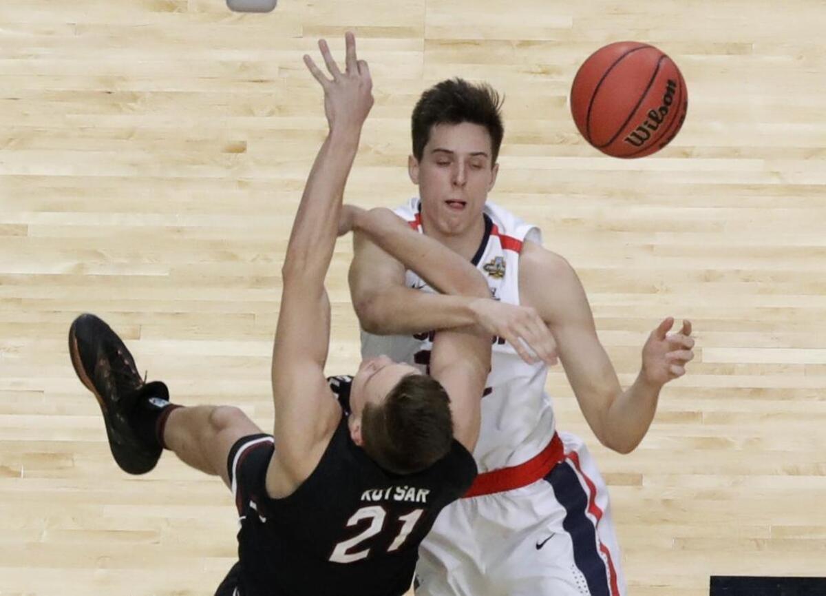 Gonzaga forward Zach Collins, top, figures to be more a long-term project than a quick-impact draft pick.