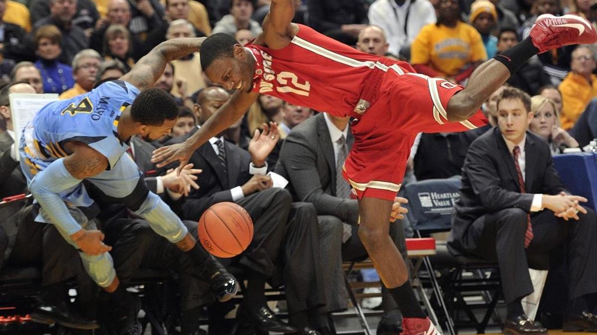 
Former Ohio State forward Sam Thompson (right) went undrafted in June. The Hornets will bring him to training camp.
