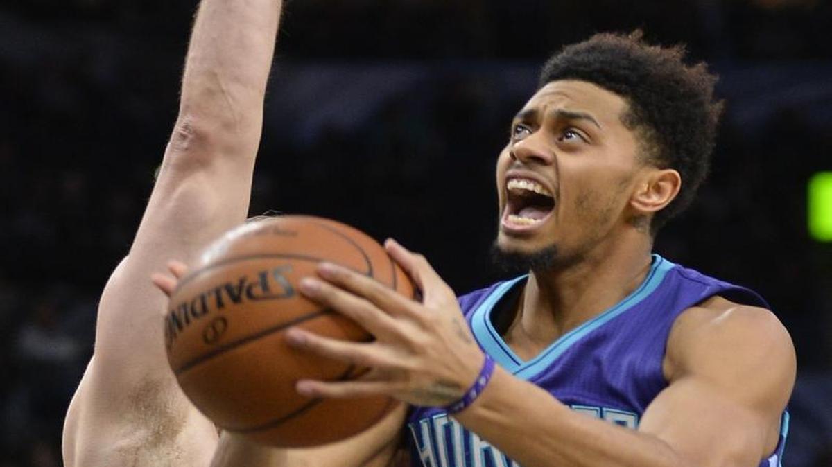 Charlotte Hornets guard Jeremy Lamb (3) shoots against San Antonio Spurs center Pau Gasol during Saturday’s game.