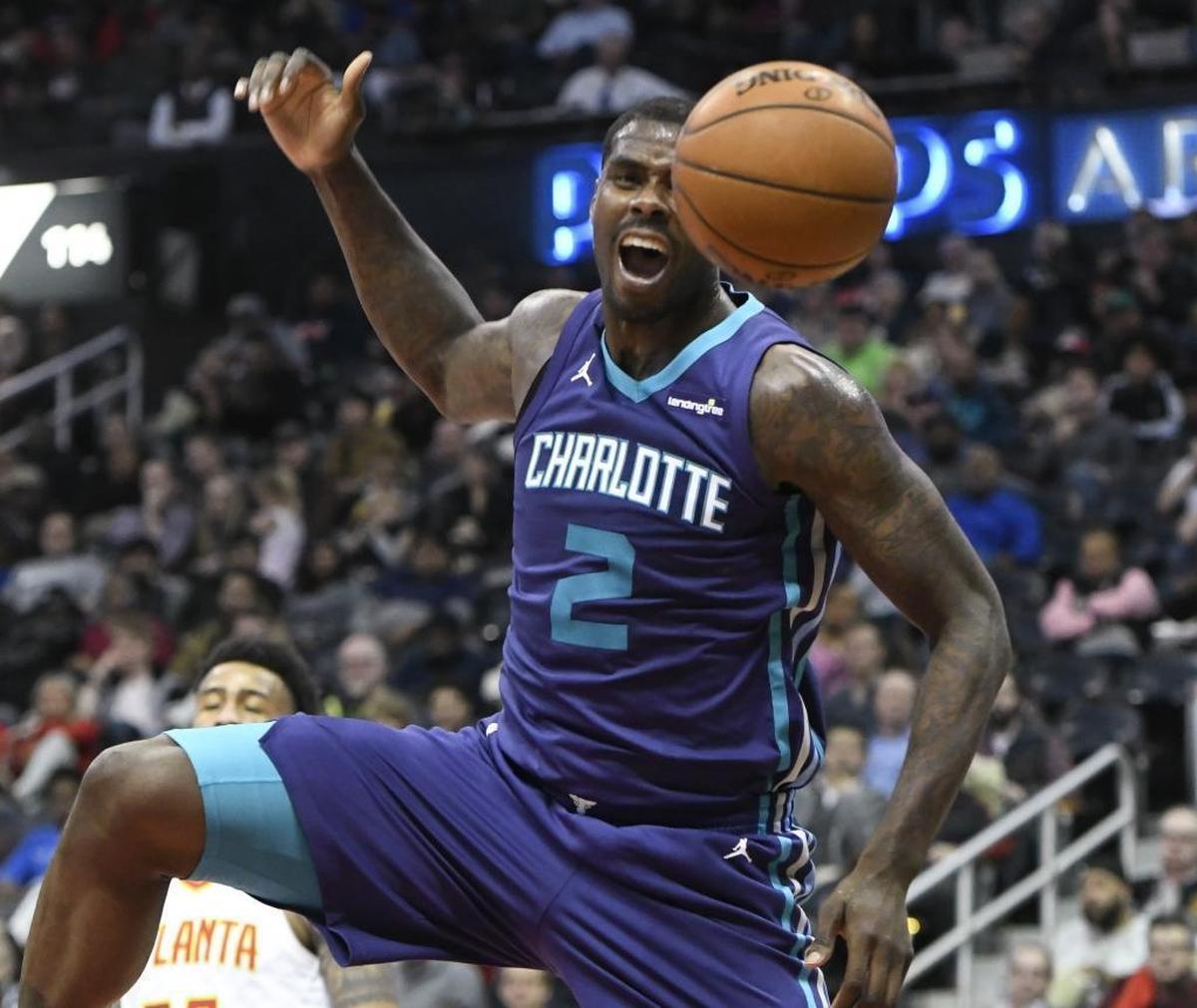 Charlotte Hornets forward Marvin Williams reacts as he comes down from a dunk against the Atlanta Hawks during the second half of Thursday’s game. Charlotte won 129-117.