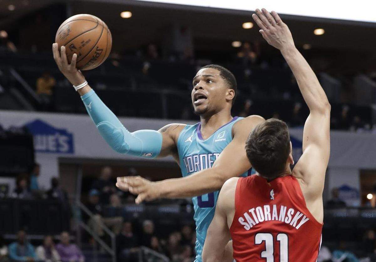 Charlotte Hornets rookie Miles Bridges (with ball) made his first NBA start Friday against the Washington Wizards at Spectrum Center.