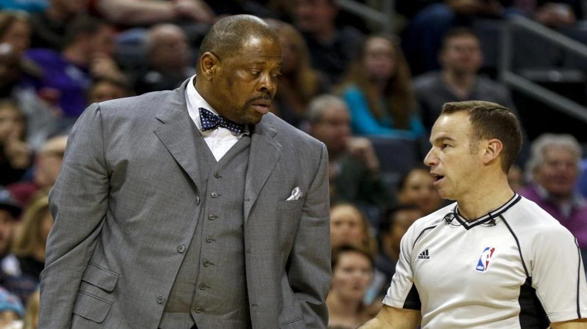 Charlotte Hornets associate head coach Patrick Ewing, left, his been hired by Georgetown, his alma mater, to take over a men’s basketball program that has fallen on hard times.