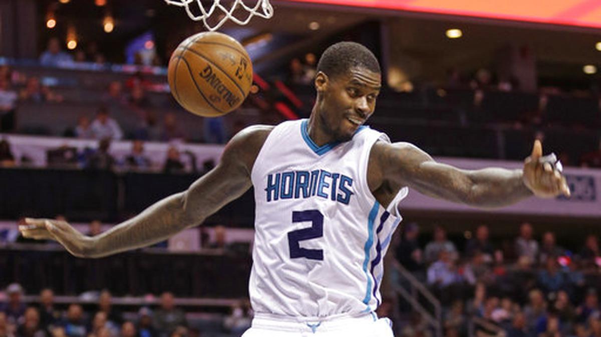 Marvin Williams (2) reacts after a dunk against the Atlanta Hawks during the second half of an NBA basketball game in Charlotte, N.C., Monday, March 20, 2017. The Hornets won 105-90. 