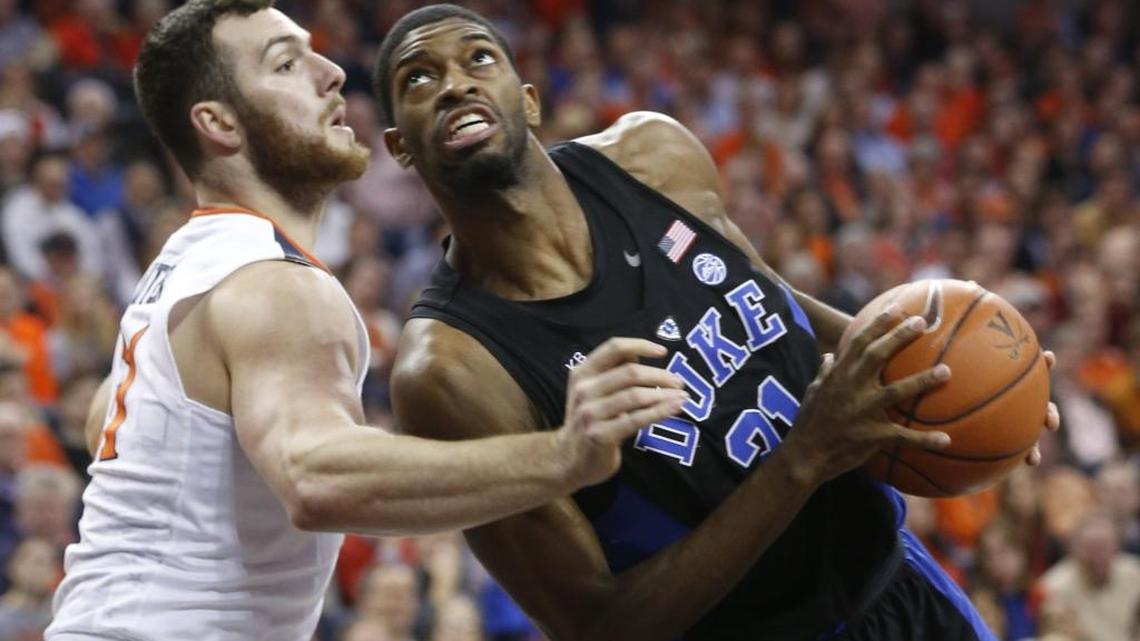 Former Duke forward Amile Jefferson, right, will be among six draft candidates working out for the Charlotte Hornets Saturday.
