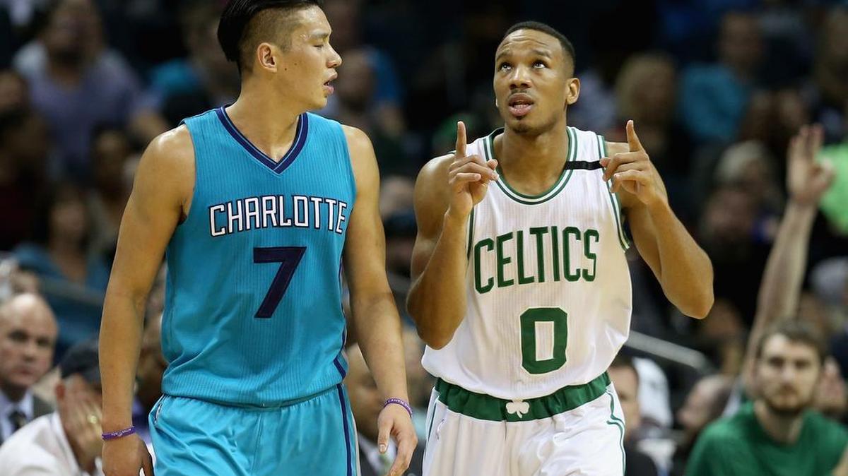 The Hornets’ Jeremy Lin watches as the Celtics’ Avery Bradley reacts after a shot during Saturday’s game at Time Warner Cable Arena.