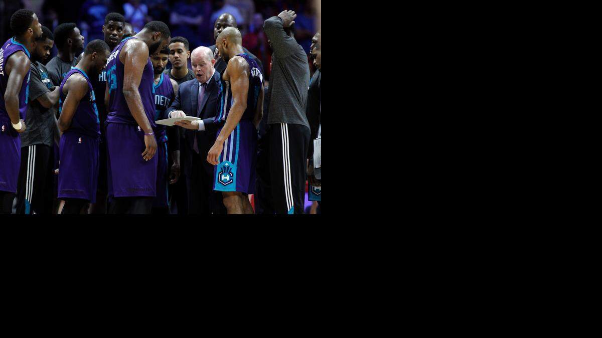 
Charlotte Hornets head coach Steve Clifford, center, draws up a play during the second half of an NBA basketball game against the Los Angeles Clippers in Los Angeles, Tuesday, March 17, 2015. The Clippers won 99-92.
