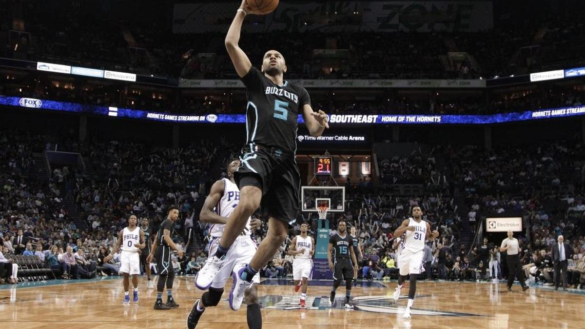 Charlotte Hornets' Nicolas Batum (5) is holding out hope he might still play in Game 4 of the playoff series against the Miami Heat Monday night.