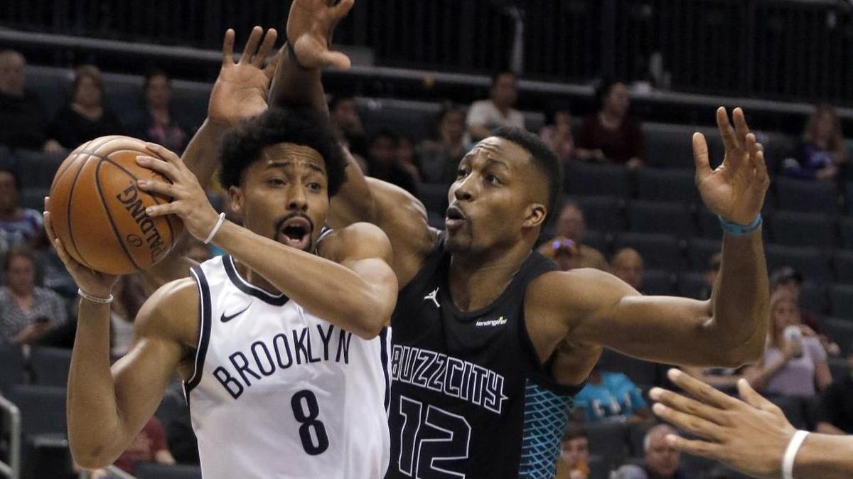 Has center Dwight Howard (12) been so good this season that making him available in a trade could solve the Charlotte Hornets’ severe salary-cap problem next season?