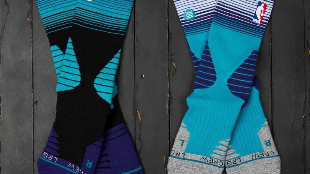 
The Charlotte Hornets’ socks will include black-and-purple dominant scheme with teal stripes, and a teal-and-gray dominant scheme with purple, black and white stripes.
