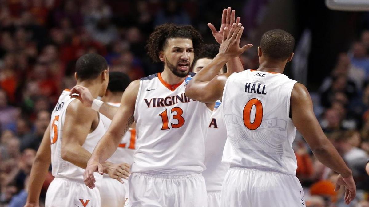 Former Virginia player Anthony Gill (13), grew up in Charlotte and his dream job is playing for the Hornets.