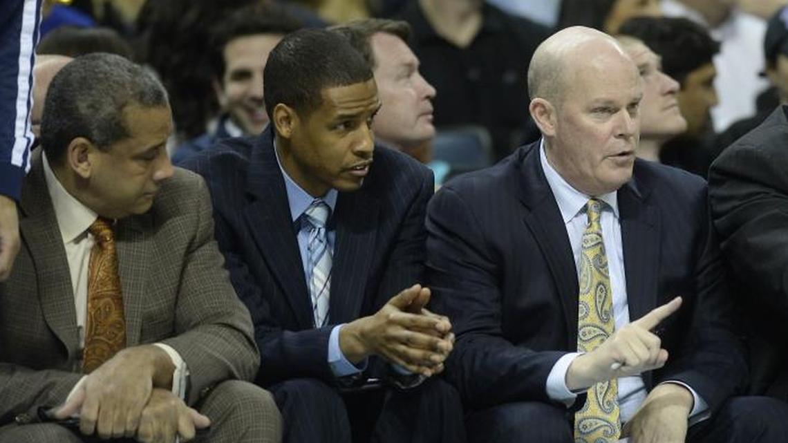 Stephen Silas (second from left) filled in as Charlotte Hornets coach Monday, with Steve Clifford (right) unavailable because of illness.