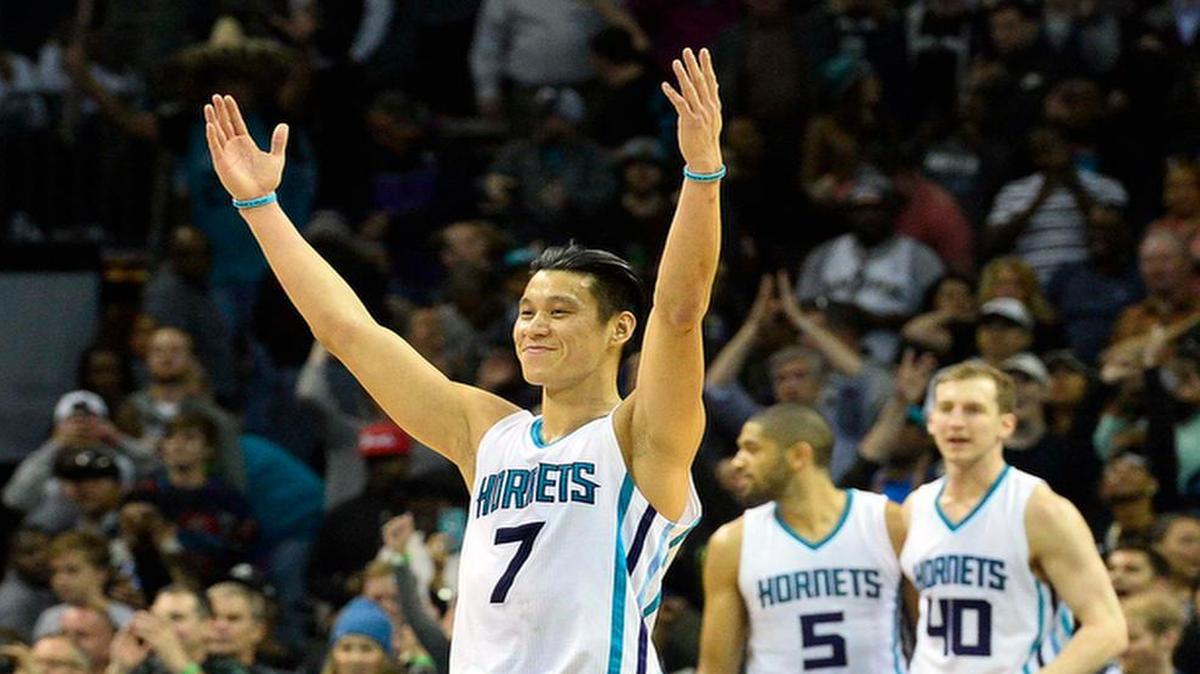 Charlotte Hornets guard Jeremy Lin on left, celebrates a victory against the San Antonio Spurs during Monday night's game played at Time Warner Cable Arena March 21, 2016. The Charlotte Hornets defeated the San Antonio Spurs 91-88.