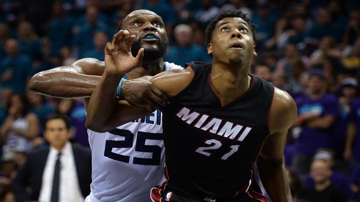 Charlotte Hornets center Al Jefferson, left, says he would take a pay cut to remain with the team next season.