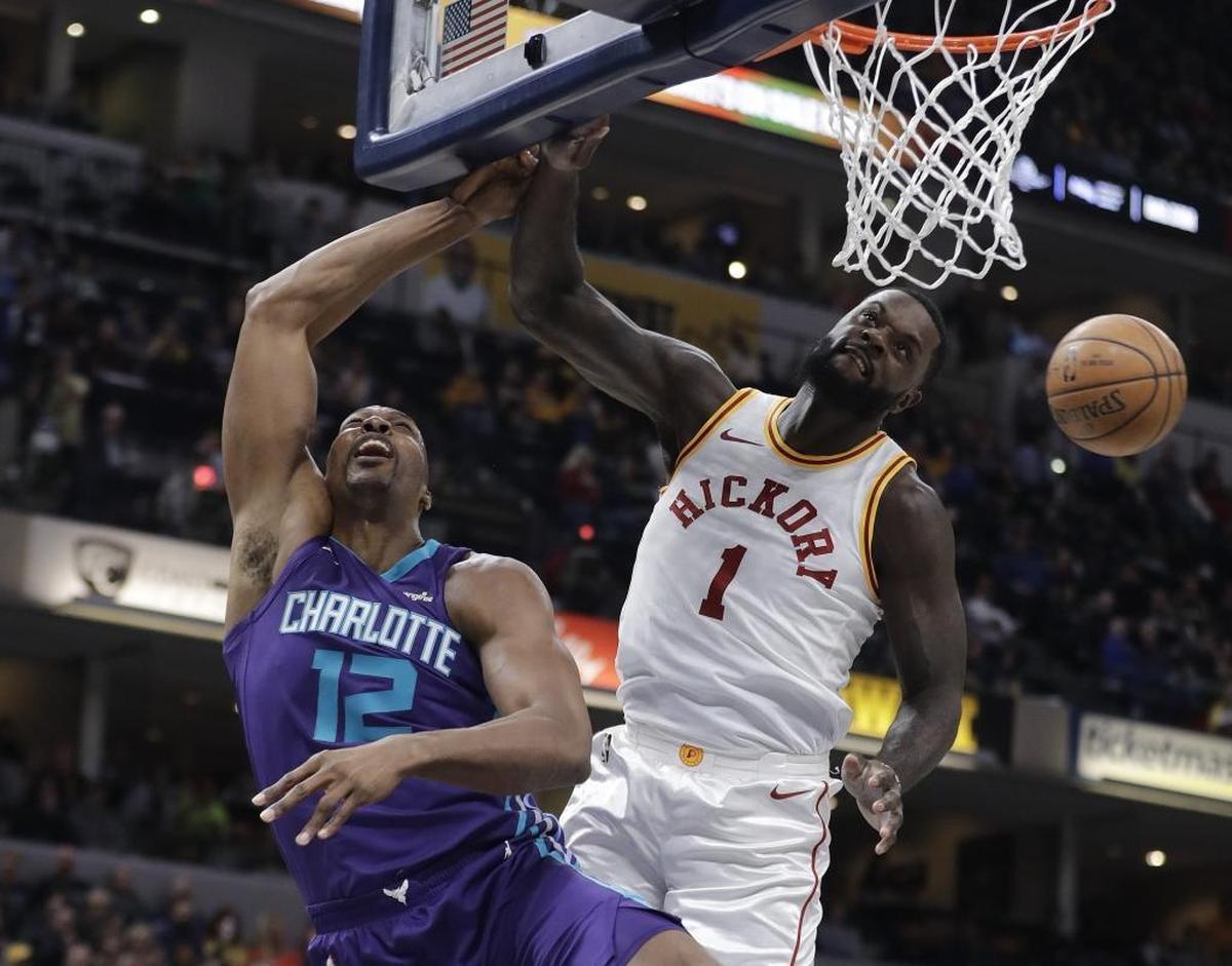 Indiana’s Lance Stephenson (right) blocked this shot by Charlotte Hornets center Dwight Howard in the Hornets' regular-season finale earlier this month. Stephenson played for the Hornets in 2014-15 before the team admitted its mistake and traded him away.