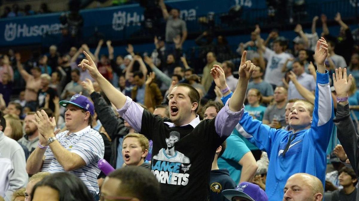 Charlotte Hornets fans cheer for their team during Wednesday night’s game played at Time Warner Cable Arena March 11, 2015.