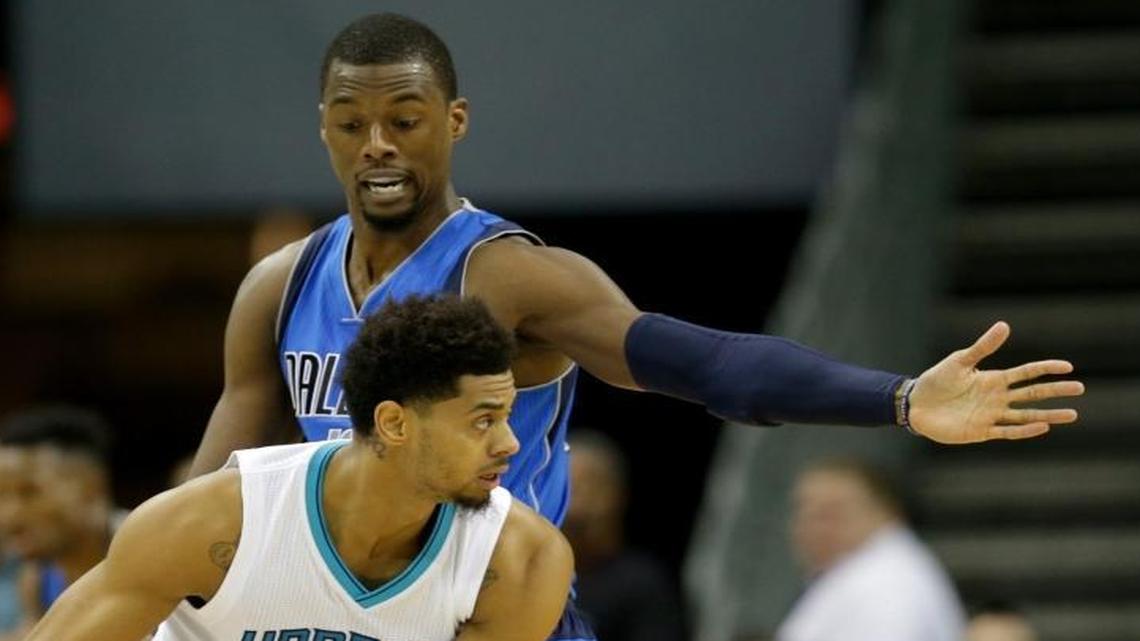 Dallas Mavericks small forward Harrison Barnes, the former North Carolina standout, defends against the Charlotte Hornets’ Jeremy Lamb (3) Thursday night in Charlotte. Barnes, in his first season with the Mavericks after four seasons with the Golden State Warriors, averages a team-high 20.3 points.