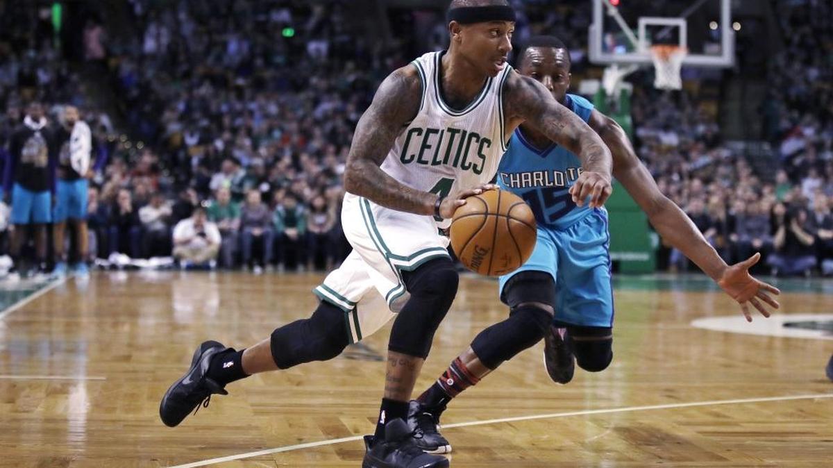 Boston Celtics guard Isaiah Thomas drives to the basket past Charlotte Hornets guard Kemba Walker during the first quarter of Monday’s game at TD Garden.