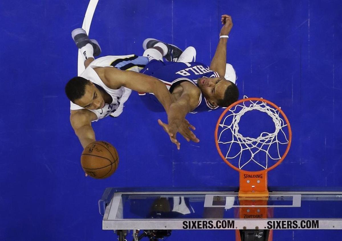 After landing with the Memphis Grizzlies in two trades this season, former UNC star Brice Johnson, left, has found the joy of basketball again.