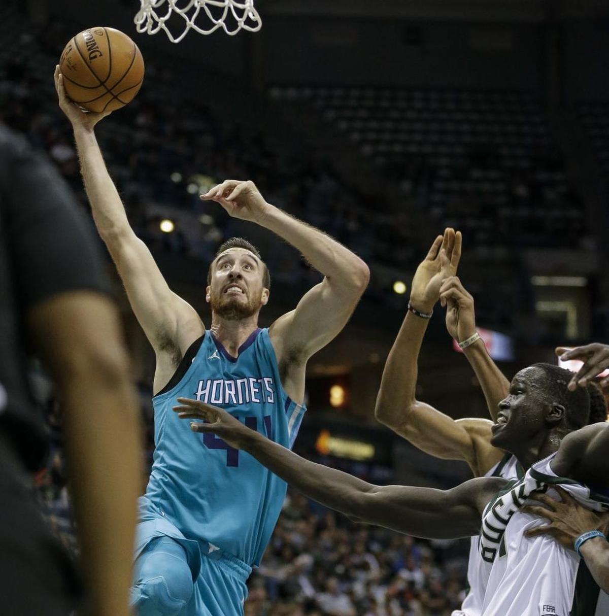 Charlotte Hornets' Frank Kaminsky goes up for a dunk against Milwaukee Bucks' Thon Maker during the first half of an NBA basketball game, Monday.