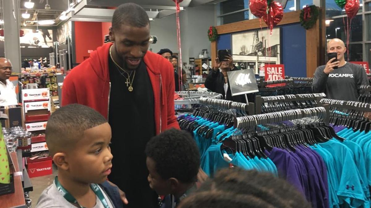 Charlotte Hornets forward Michael Kidd-Gilchrist shops with 10 children from Partners for Parks on Tuesday at Dick’s Sporting Goods at Southpark.