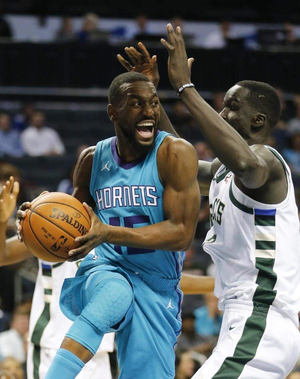 Charlotte Hornets guard Kemba Walker scored 20 of his 26 points in the first half of Wednesday’s game against the Milwaukee Bucks.