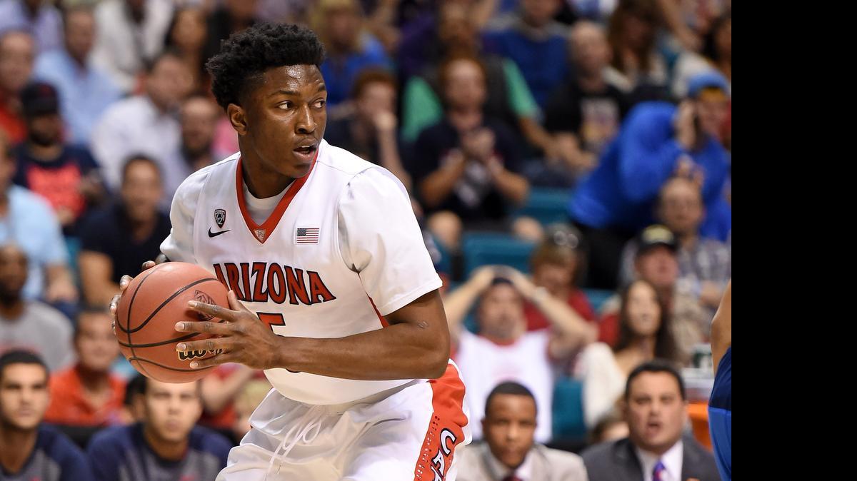 
Arizona small forward Stanley Johnson, who is built like an NFL tight end at 6-foot-6 and a muscular 225 pounds, could be available when the Hornets pick at No.9 in the NBA draft.
