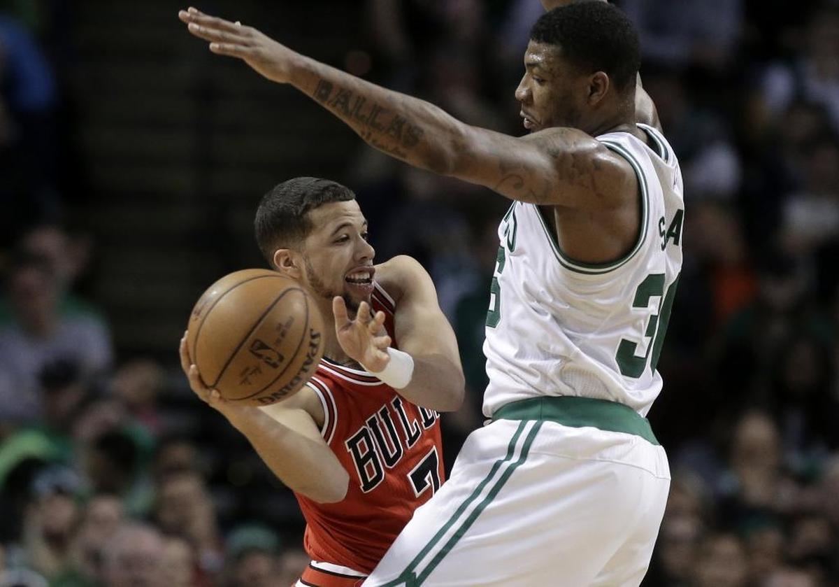 Former NBA Rookie of the Year Michael Carter-Williams, left, has been traded twice in four seasons. His latest team, the Chicago Bulls, chose not to make him a qualifying offer to restrict his free agency.